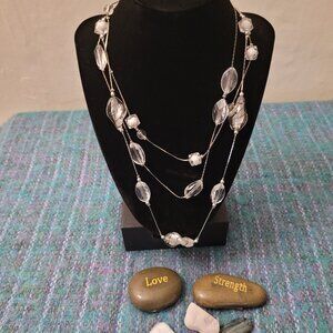 Silver toned 3 strand chain with clear glass beads with black stripes